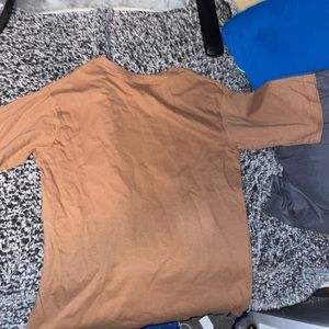 New. Never worn. Small but oversized